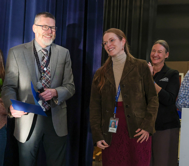 Bend-La Pine Schools Superintendent Steven Cook presents Sky View Middle School teacher Loren Renfroe with the 2025 Educator of the Year award. (Submitted/Bend-La Pine Schools).